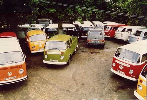 VW campervans parked in yard